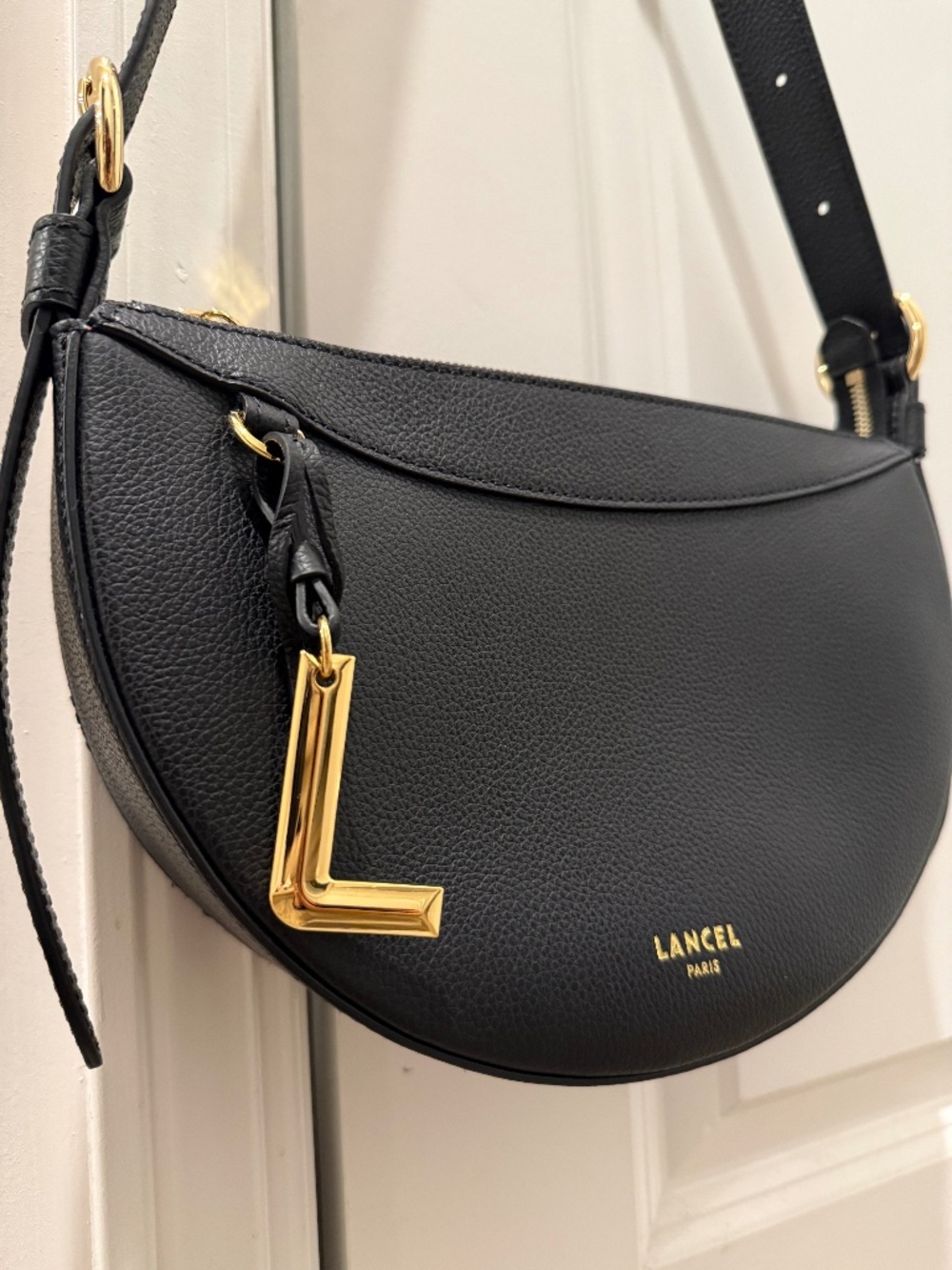 Lancel Paris, half moon crossbody bag 100% leather